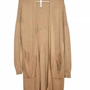 A camel colored lulu lemon cardigan. Cozy but still light it perfect for fall!